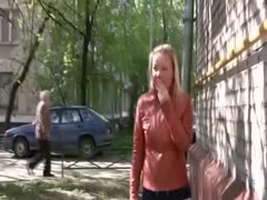 Behind the gate, a lustful white Slavic woman with golden hair gets her underwear saturated.